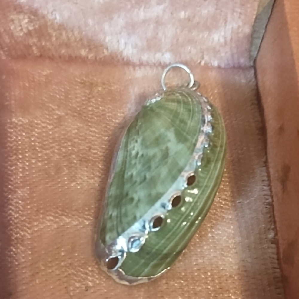 Elegant Green Shell Pendant with Silver Accents